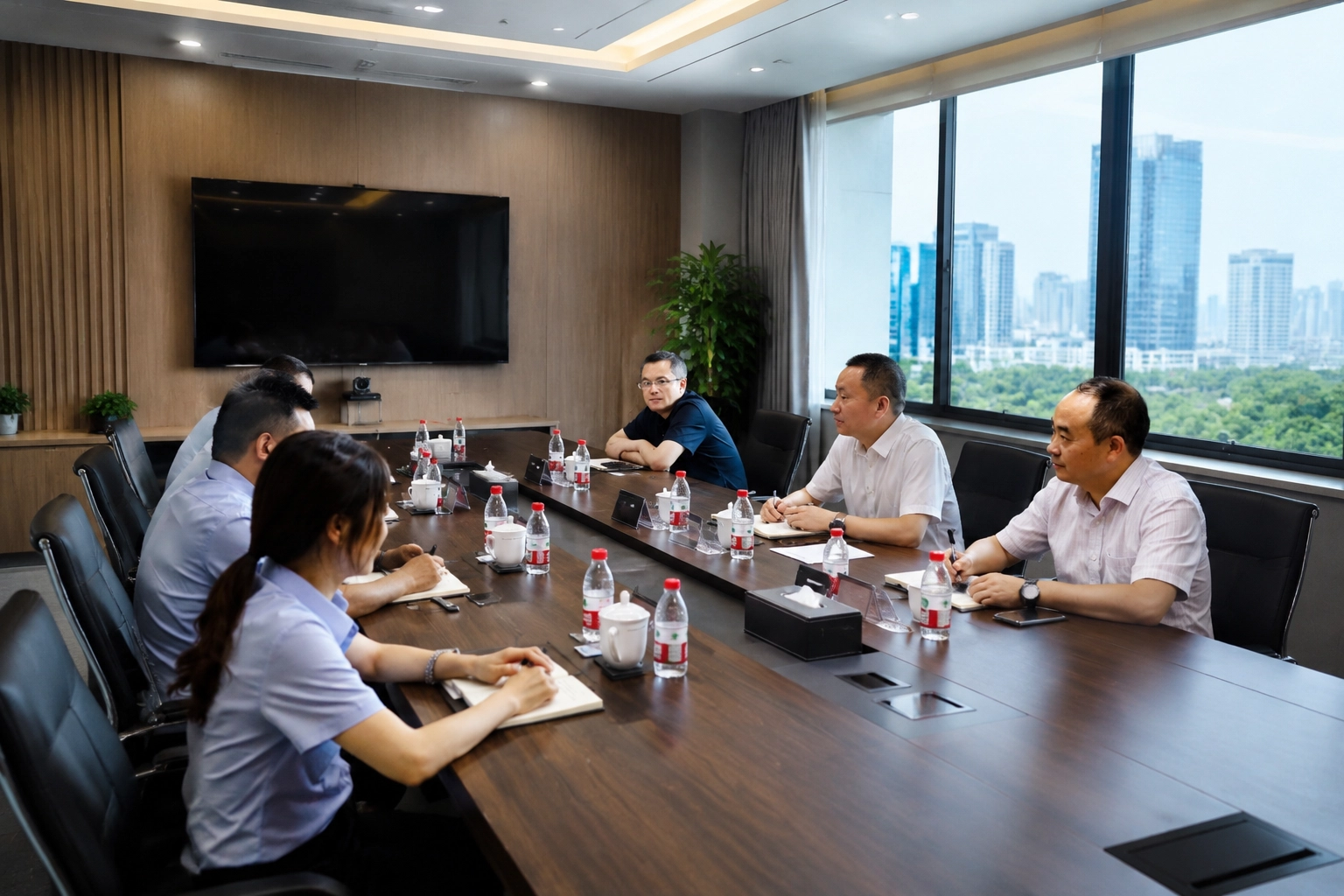 Tri-Ring Chairman Mr. Wang Hanrong and his delegation during the meeting.